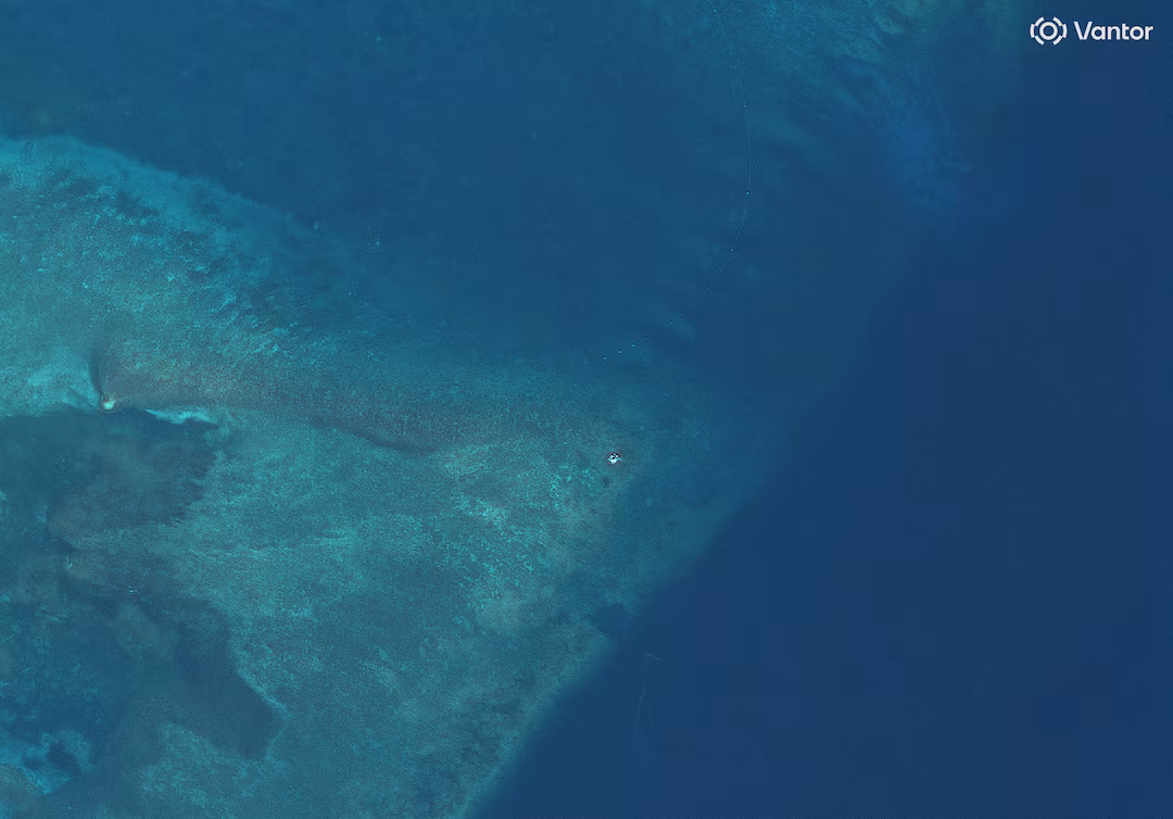Satellite Images Show Suspected Structure at Disputed South China Sea Atoll, But Later Gone photo
