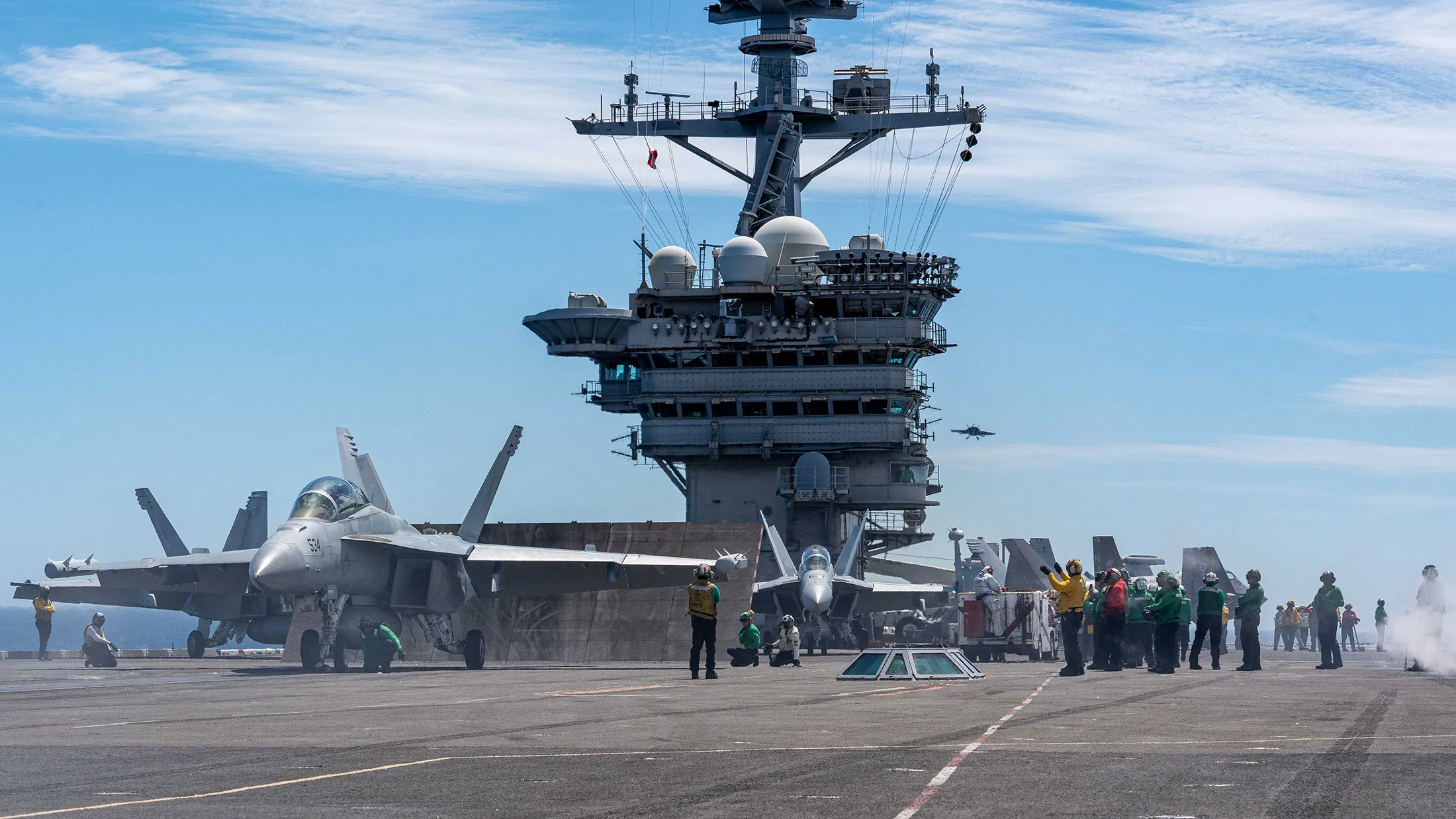 US Adds Carrier And 10,000 Troops To Mideast photo